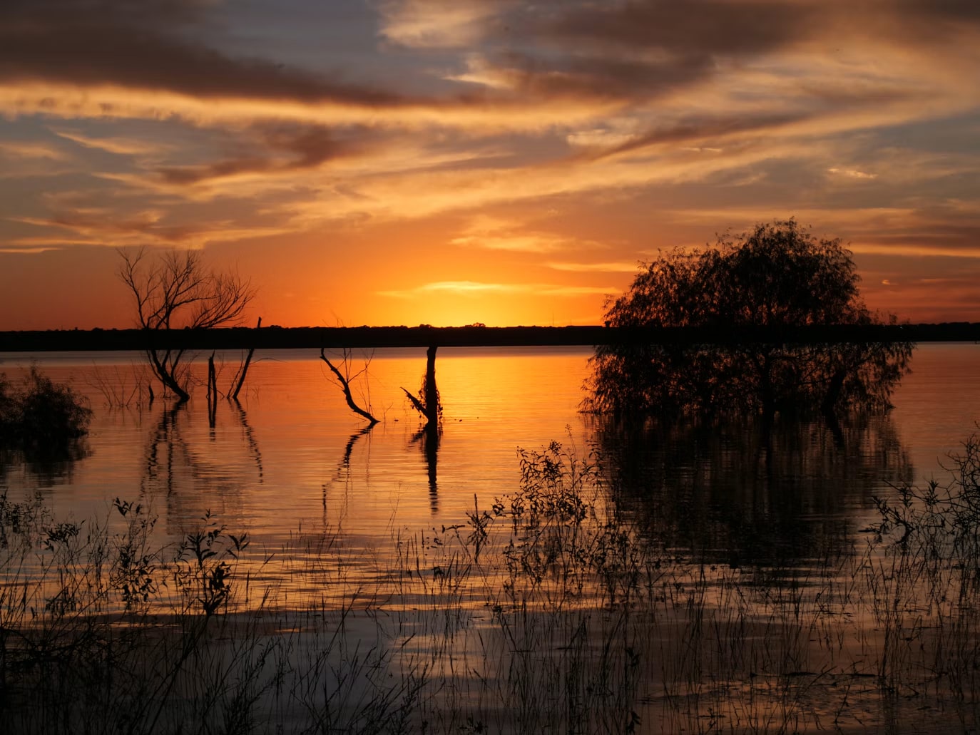 Sunset reflected on Grapevine Lake